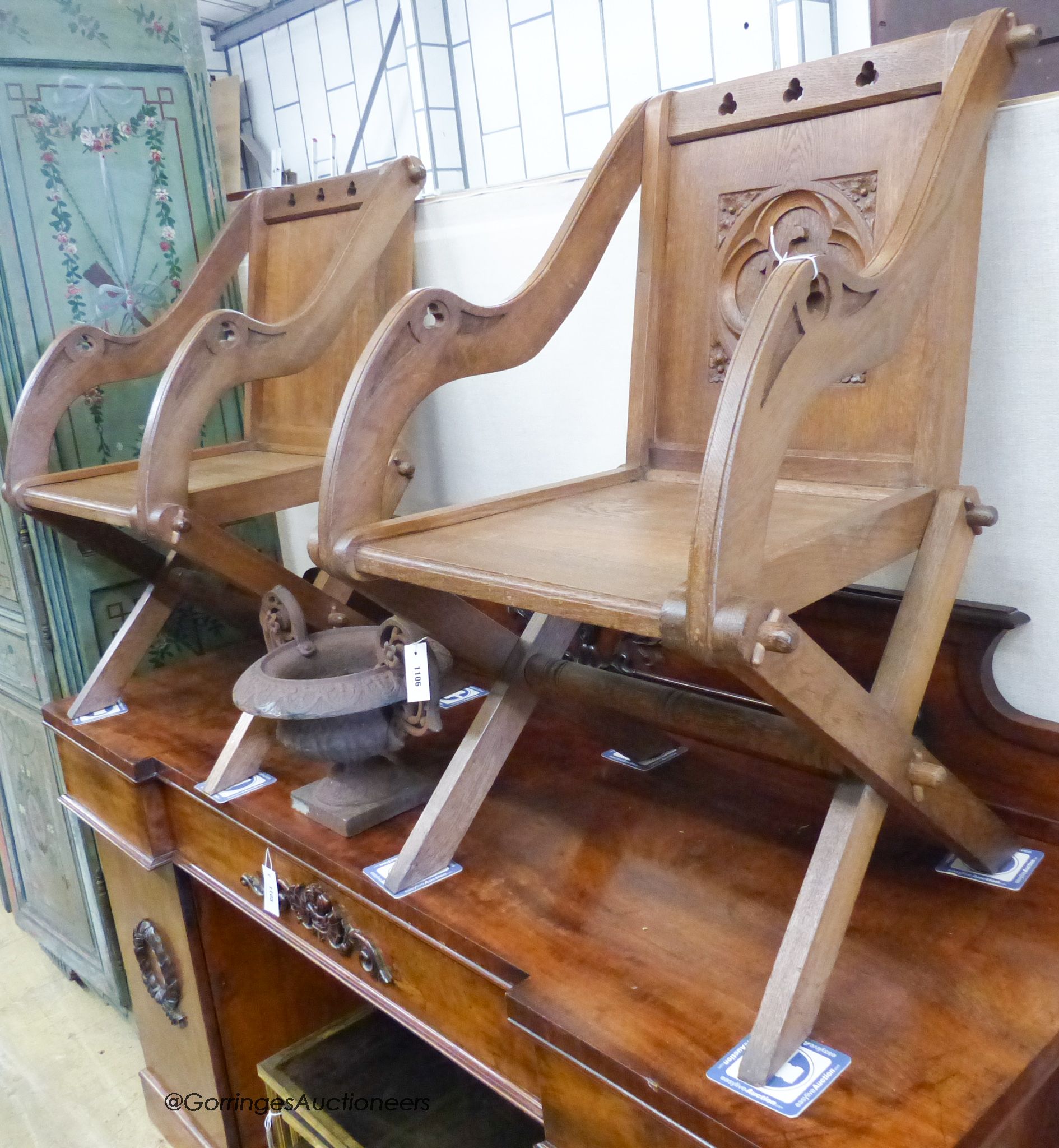 Three oak Glastonbury chairs.